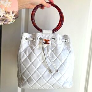 CHANEL Matelasse Tortoiseshell Hoop Handle White Lambskin Drawstring Bag